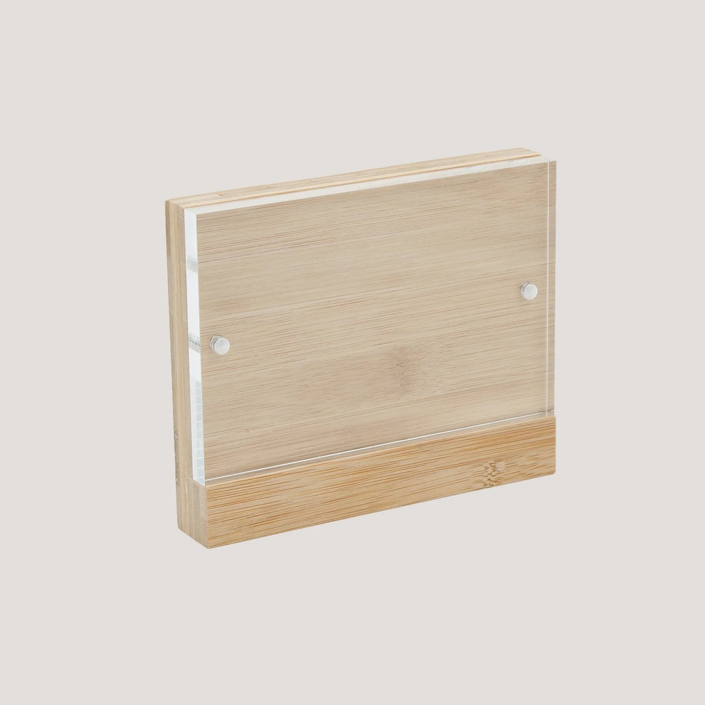 Bamboo panel with a acrylic insert fixed on by small magnets