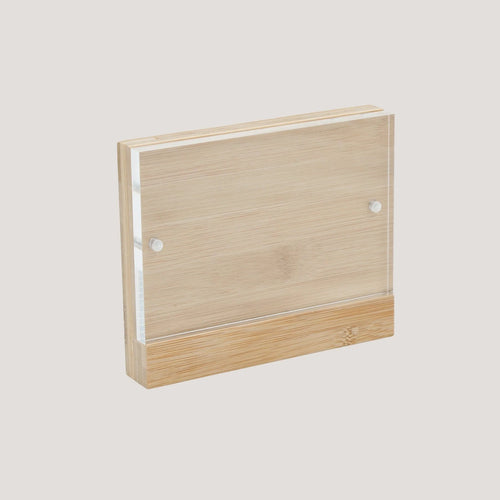 Bamboo panel with a acrylic insert fixed on by small magnets