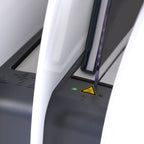 Close-up of a white 8.4 thermal binding device
