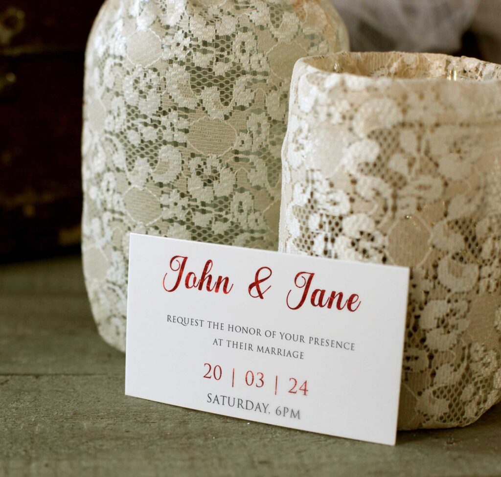 Wedding invitation card with red foil design 