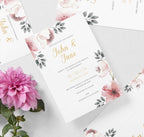 Floral wedding invitation with pink flowers and gold text on a white background